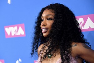 SZA Debuts New "Slime" Look: Fresh Neon Hair Stuns Her Fans
