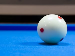 Why Do Cue Balls Have Red Dots?