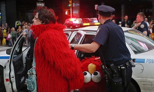 'Evil Elmo' who spouted anti-Semitic bile while dressed as Sesame Street character is jailed for $2million plot to blackmail the Girl Scouts