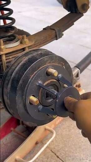 He installs the tool head as a strong cover, secured tightly with bolts for better stability overall