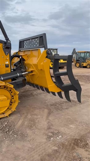 Rake and root plow combo on this John Deere 700P | Phillips Welding Services