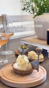 Raquel Royers | Wine & Lifestyle on Instagram: "CHEESE FLOWERS 勞燎 My new favorite hosting hack. Comment CHEESE & I’ll send ya the link. . . Tip: when using a cheese curler, aka girolle, use a cheese like P’tit Basque or Tête de Moine. When shaved thinly, it melts in your mouth. So delicious! . . . . #wine #wineandcheese #cheesecurler #girolle #cheese #cheeseboard #hostinghack #amazonfind #amazonprime"