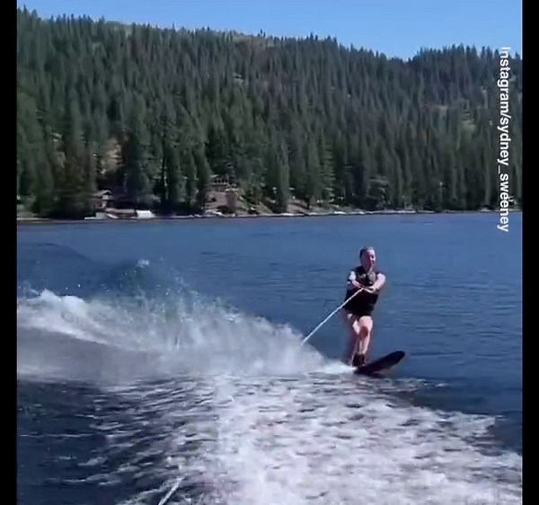 Video: Sydney Sweeney downs a Bai drink with one hand while waterskiing | Daily Mail Online