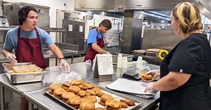 Short-staffed school districts are hiring students to serve lunch