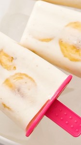 The easiest summer BANANA POPSICLES! Make in 10 minutes & freeze! TAP recipe link in bio https://reluctantentertainer.com/banana-popsicles/ #bananapopsicle #bananapop #reluctantentertainer #frozenbananas #summerpopsicles | Reluctant Entertainer