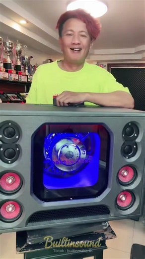 DIY Bluetooth speaker enclosure with 12-inch bandpass subwoofer, built-in sound.