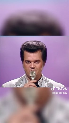 "Don't Cry Joni" is a country song performed by Conway Twitty and Joni...