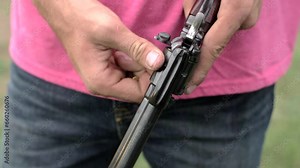 4K 60 Fps Slow Mo 22Mm Hand Gun Loading Bullets Into The Revolver Shells Shooting Target Practice