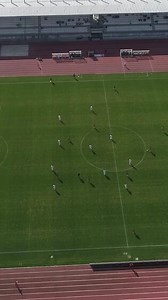 Vertical Video of Soccer Match in Stadium Aerial View