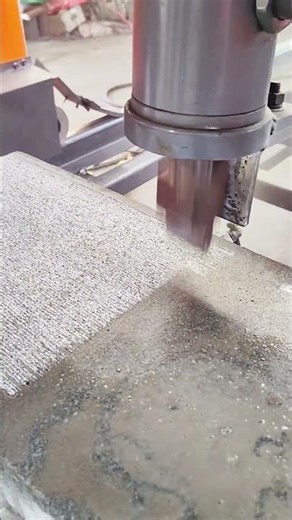 Industrial Machine Creating Textured Finish on Stone Surface