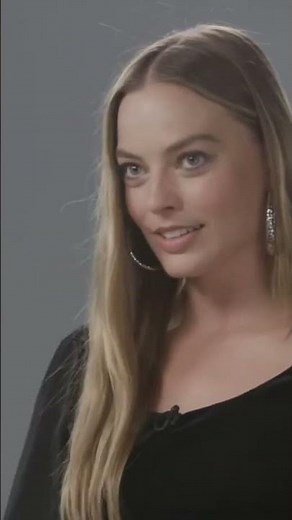 margot robbie's laddered tights