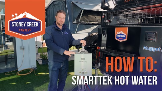 Join Chris in our latest "How To" video on how to operate the portable SMARTTEK Hot Water System for your caravan or camper. | Stoney Creek Campers