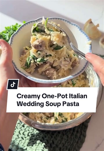 Make some room for seconds and thirds because you won't be able to get enough of this Creamy One-Pot Italian Wedding Soup Pasta! 🥣 It's is on the table in half an hour and there's virtually no cleanup. Get the full recipe below or in the link @allrecipes bio! 🧡 Ingredients: 1 tablespoon olive oil (optional) 1 small onion, finely chopped 2 cloves garlic, minced 1 (12 to 16 ounce) bag frozen cocktail meatballs 3 cups chicken broth 1 cup orzo pasta 3 cups fresh spinach or kale 1/4 cup heavy cream