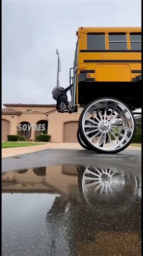 School boy Struggles to Board Lifted School Bus