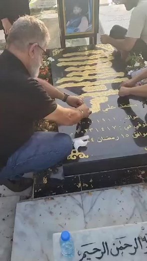 Cemetery Ritual: Group Gathering at Gravestone