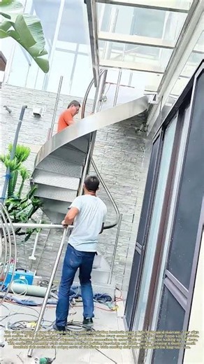 Fitting Railings: How Workers Assemble Handrails For Curved Staircases