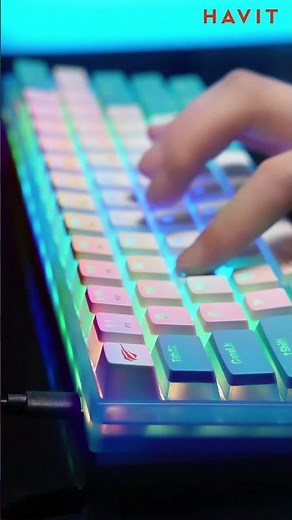 Experience the magic of vibrant lights and crisp clicks with #KB877L keyboard close-up.