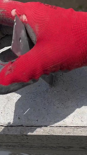 Effective Concrete Surface Cleaning with Metal Scraper