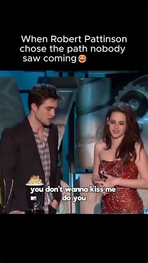 @greenflagsus on Instagram: "At the 2011 MTV Movie Awards, Robert Pattinson and Taylor Lautner had a moment that instantly went viral when Pattinson unexpectedly kissed Lautner on stage. It happened after The Twilight Saga: Eclipse won Best Kiss; Pattinson joked about how Lautner had been "hovering" all night and then leaned in and kissed him, flipping the intense Team Edward vs Team Jacob rivalry into pure comedy. The crowd went wild because it completely disarmed the hyper-serious fandom narra