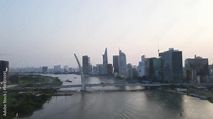 Modern design of cable-stayed Ba Son bridge over Saigon river, HCMC; drone