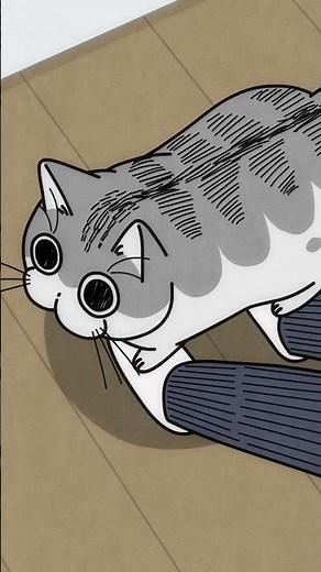 足元でアピールするネコ