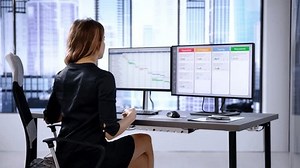Frustrated Manager With Kanban Board and Gantt Chart On Screen