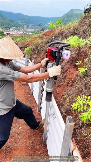 Driving Soil Anchors: How Gas-Powered Pile Drivers Secure Hillside Retaining Walls