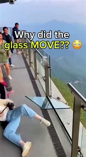 Glass Wall Panel Shifts While Tourist Leans On It 😱 (CCTV)