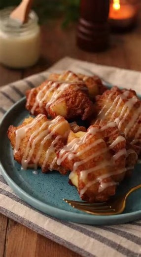🍎 Air Fryer Apple Fritters 🍩 Crispy on the outside, soft and cinnamon-sweet on the inside, these air-fried apple fritters are a delicious treat without the mess of deep frying, perfect for breakfast or dessert! Ingredients: 1 cup all-purpose flour 1/4 cup granulated sugar 1 1/2 teaspoons baking powder 1/2 teaspoon cinnamon 1/4 teaspoon salt 1/4 cup milk 1 large egg 1 teaspoon vanilla extract 1 tablespoon melted butter 1 cup peeled, diced apples (about 1 medium apple) Olive oil spray Glaze (opt