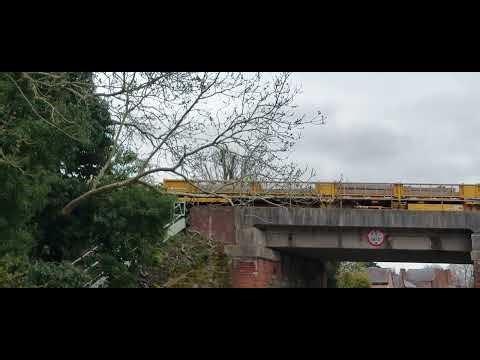66739 'Bluebell Railway' passes over Wharf Street bridge in Warwick 