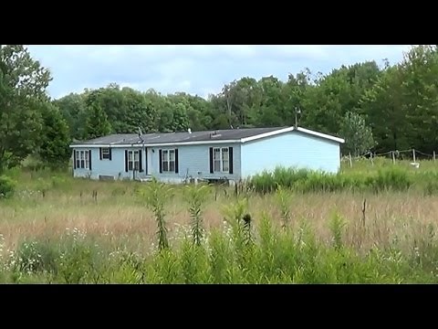Abandoned Double wide Mobile Home with huge Pond