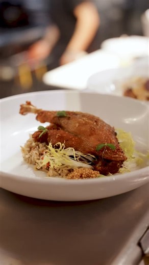 Mezzaluna on Instagram: "Duck leg confit is one of those timeless comforts. Slowly cooked until impossibly tender, then we finish ours with a quick fry to crisp the skin until it crackles. It’s rich, warm, deeply satisfying. duck leg confit (gf) | dirty wild rice, braised red cabbage, pickled mustard seed, frisée"