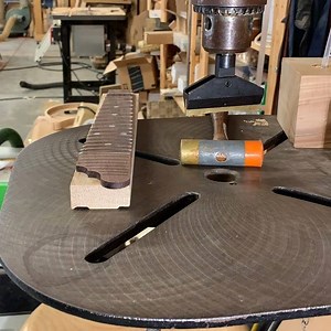 Pressing frets with the @stewmac_guitar fret cauls. Stewmac really hooked us up well for this class. Instrument making, much like chairmaking, is a whole other ballgame with its own toolkit. It’s fun finding crossover, Like using travishers to scoop out the inside or spokeshaves and shavehorse to refine tone bars, but as a total tool nut, I’m massively geeking out about all these specialized tools as well. #wood #woodworking #mandolin #mandolinbuild #instrumentmaking #luthier #luthiery #fret #bu