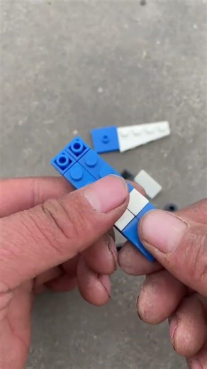 Here are some building blocks. Let’s put them together to see what they are. LEGO hand-unpacked