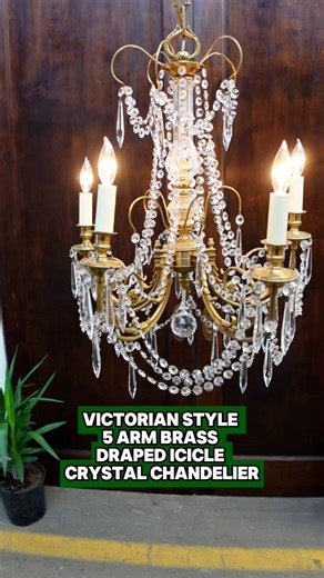 This lighting fixture captures the essence of Victorian design, featuring brass arms. ✨ The chandelier is adorned with draped crystal strands and icicle crystals with five arms, each holding a candle style light. 🕯️ This is in good condition with appropriate wear from age. The price includes restoration of cleaning and rewiring. This light requires five candelabra light bulbs. 💡 🔗 ogtstore.com 🔗 📩 Message us for more information! 📍 400 Gilligan St, Scranton, PA 18508 📍 300 Brook Street, S