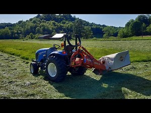 mowing, raking and baling small square bales