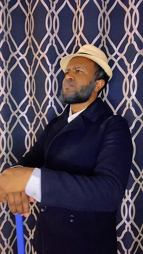 Person Interacting with a Blue Object in Geometric Setting