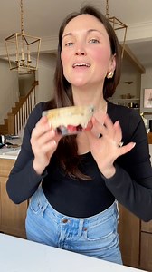 This protein yogurt bowl combines berry yogurt with PB2 and cottage cheese, served over berries with crunchy cereal on top. It’s giving PB&J vibes and is packed with 40 grams of protein per serving! | Eating Bird Food