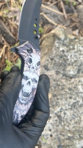 Handcrafted spring assisted knife with 3d printed skull design