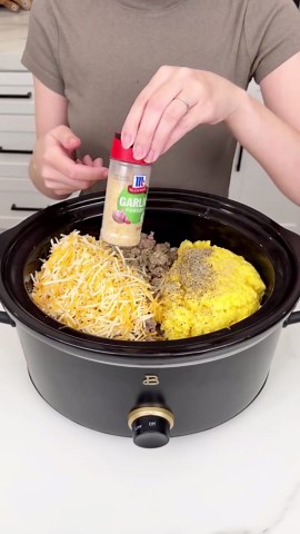 Crockpot sausage gravy and biscuits everyone will love!