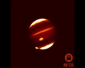COMET SL9 HITS JUPITER