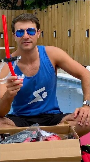 Stationary Swimming with a Tether and Snorkel