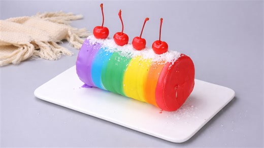 Rainbow roll cake with cherries