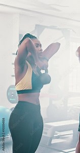 Athlete, black woman and kettlebell for fitness at gym with breathing exercise, resilience training and strong muscle. Person, equipment and weightlifting for workout, performance and sport challenge