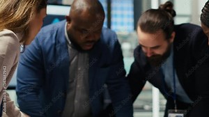 Factory engineers study detailed schematics of solar panel assembly lines, refining production layouts using tablet. Industrial plant experts outlining configurations for new prototypes, camera B vídeo de Stock