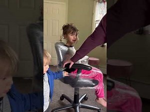 Saran wrapped to a chair!