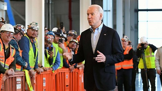 Biden gets in heated exchange on guns with auto worker