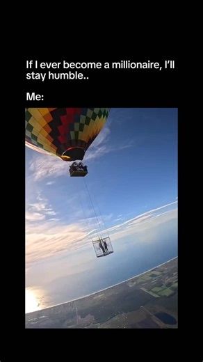Men Set Standards on Instagram: "A hot air balloon floats more than 2,000 meters above the ground, carrying a young guy and a girl inside a clear box filled with $100,000 in cash. With nothing but open sky around them, the moment already feels unreal—calm, beautiful, and absolutely unhinged at the same time. Then it turns insane. He starts throwing the money out into the air, bills exploding and raining down over the landscape below. Seconds later, he jumps after it, free-falling through the sky