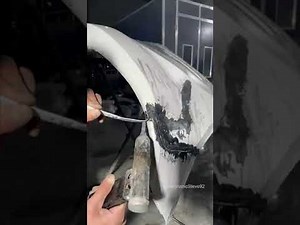 réparation de pare-chocs en plastique et peinture de voiture blanche