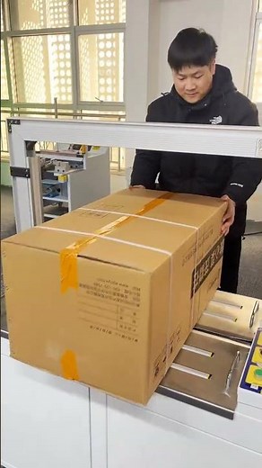 Large cardboard boxes can be easily packed with this automatic strapping machine